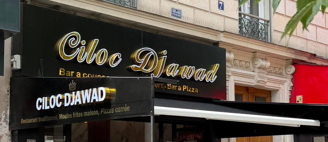 Devanture du restaurant Ciloc Djawad, 7 avenue Philippe Auguste : enseigne dorée et terrasse sous auvent